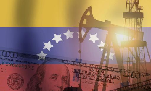 Pump jack, US dollar notes and Venezuela flag background. (Source: Shutterstock)