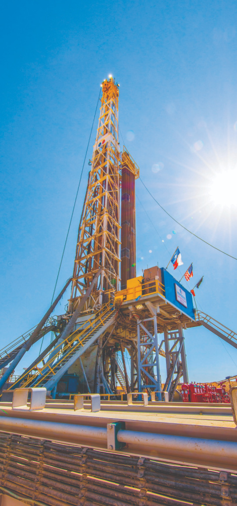 Hart Energy - Oil and Gas Investor Magazine July 2022 - BP Dave Lawler C-suite Chat - BPX Energy Delaware Basin electric drilling rig image
