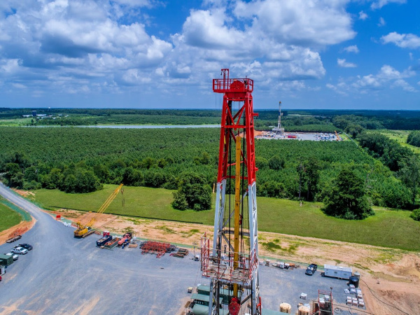 Big E Rig 2 on the RCHSN Haynesville two-well pad and Nabors X-07 on the three-well WLCX Haynesville pad (background) drill for operator Indigo in DeSoto Parish, La. (Source: Indigo Natural Resources)