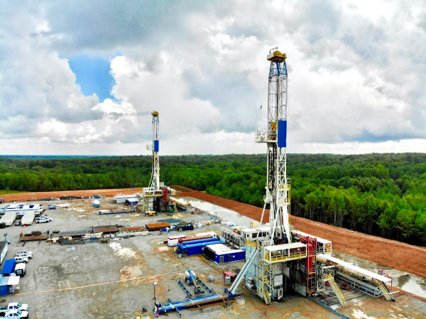 Nabors’ X-33 and X-07 rigs on the four-well Hesser pad, drilling for Indigo, targeting stacked Haynesville and Bossier targets in DeSoto Parish, La. (Source: Indigo Natural Resources)
