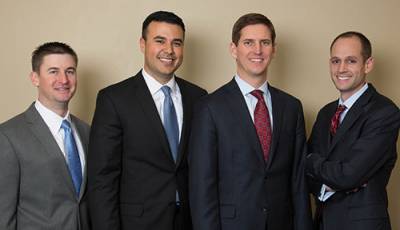 The Tall Oak leadership team from left to right: COO Lindel R. Larison, CCO Carlos P. Evans, CFO Max J. Myers and CEO Ryan D. Lewellyn.