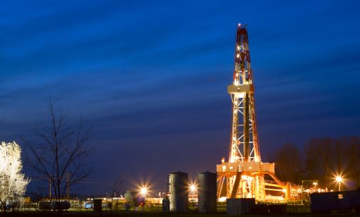 Evolution Petroleum oil well at night