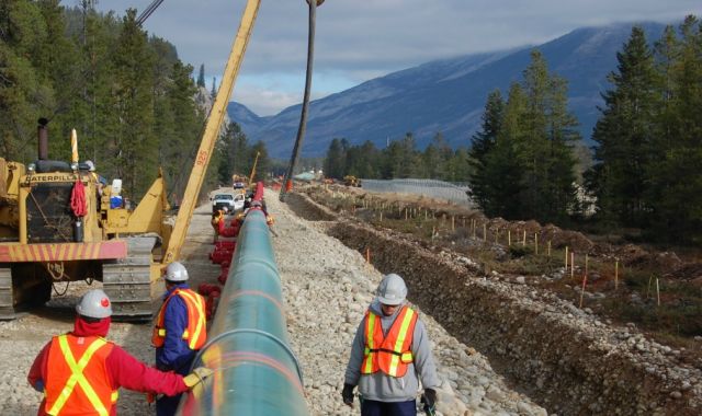 Construction of the Trans Mountain Pipeline.