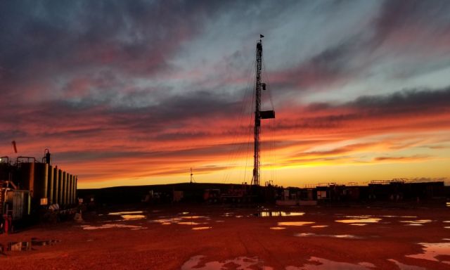 The sun sets at a North Dakota oil field. (Source: Shutterstock.com)