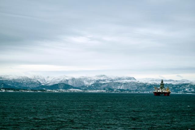 An oil rig is shown offshore Norway. (Source: Avigor/Shutterstock.com)