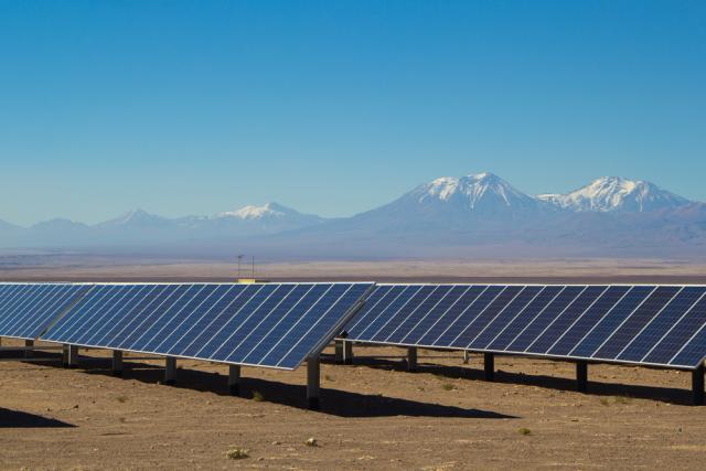 Photo of solar panels in the Atacama Desert.