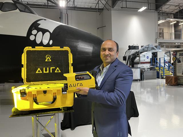 Saurabh Nitin holds the prototype of the AURA OGI.