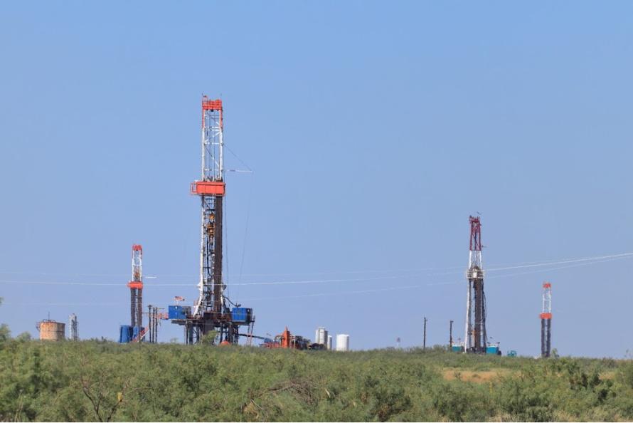 Multiple rigs drill for oil in the Permian Basin. (Source: GB Hart/Shutterstock.com)